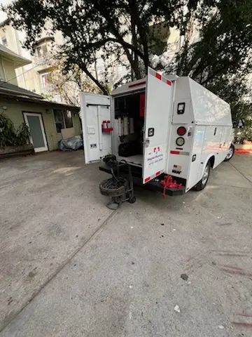 Magnet Plumbing service vehicle on-site for Water Heater Repair in East Lake-Orient Park